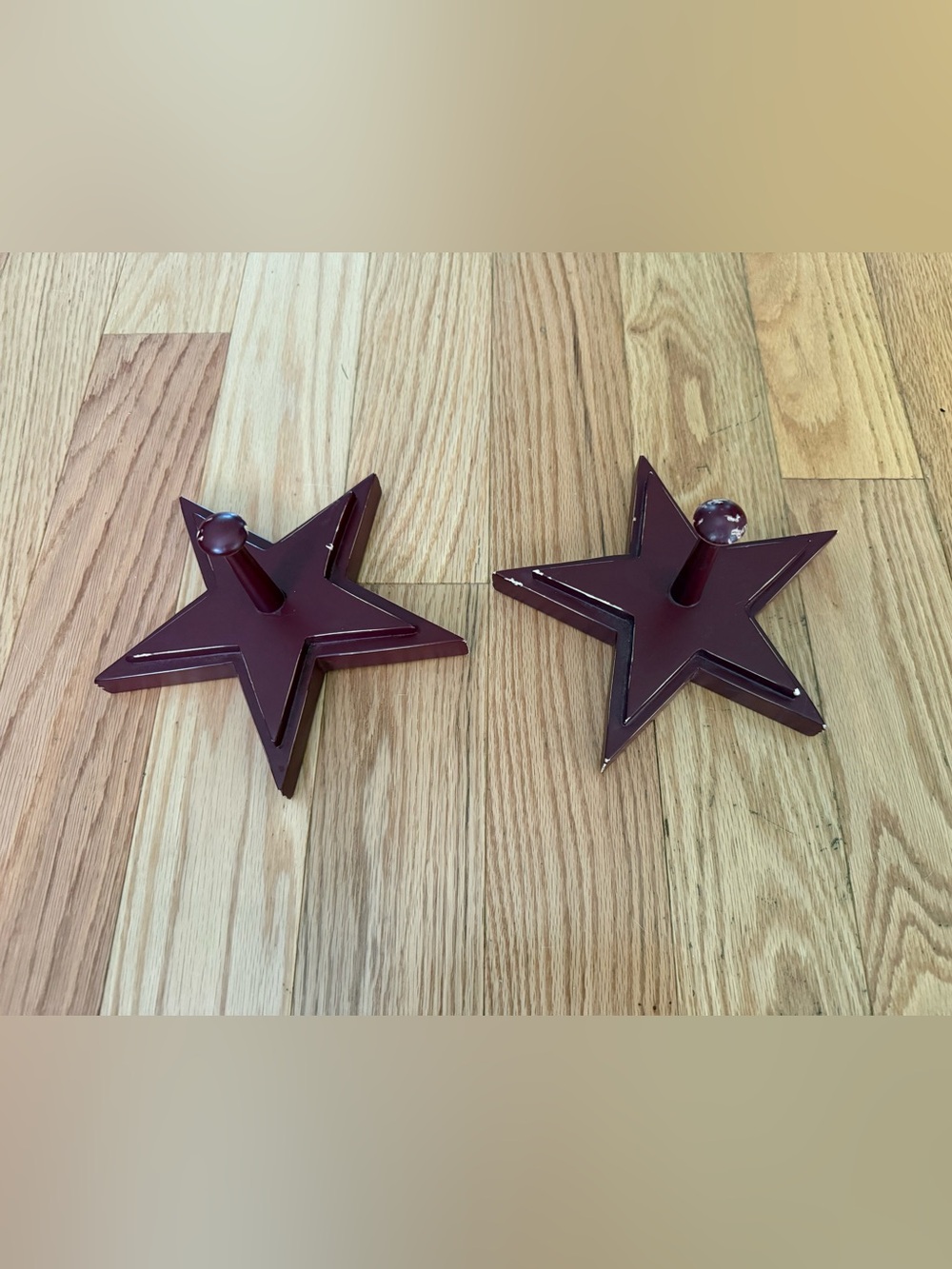 Pottery Barn distressed star shaped wall hooks maroon color 7”